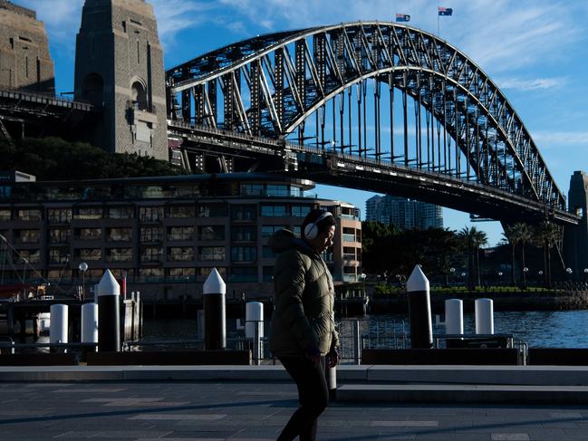 SYDNEY, AUSTRALIA - NewsWire Photos - JULY, 20, 2021: People exercise along an empty Campbell's Cove, in Sydney. Picture: NCA NewsWire/Bianca De Marchi