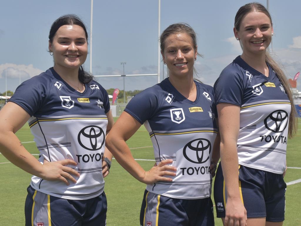 Zoe Martin (left), Alicia Martin and Kortney Deguara in the new North Queensland Gold Stars jerseys at BB Print Stadium ahead of the QRLW season. Picture: Matthew Forrest