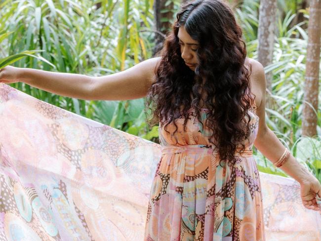 Wollongbar's Kylie Caldwell has been named a finalist in the 2023 National Indigenous Fashion Awards. Here her daughter Kyeoma Caldwell models an Evelyn Travel Scarf and Maleisha Moo Strappy Maxi Dress.