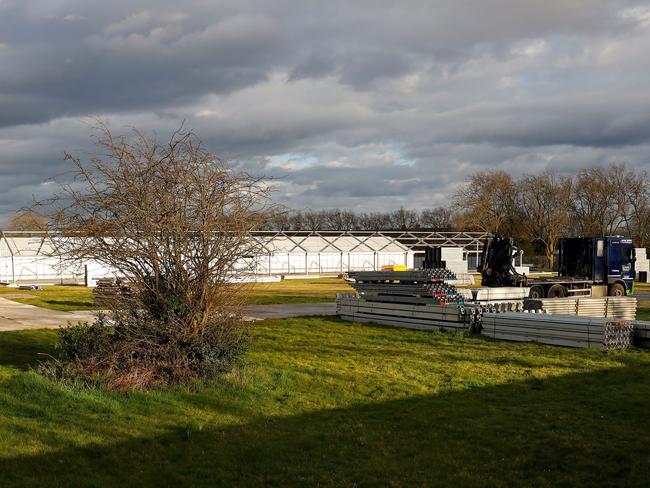 The site of a temporary mortuary being constructed in Manor Park, East London. Picture: Tolga Akmen