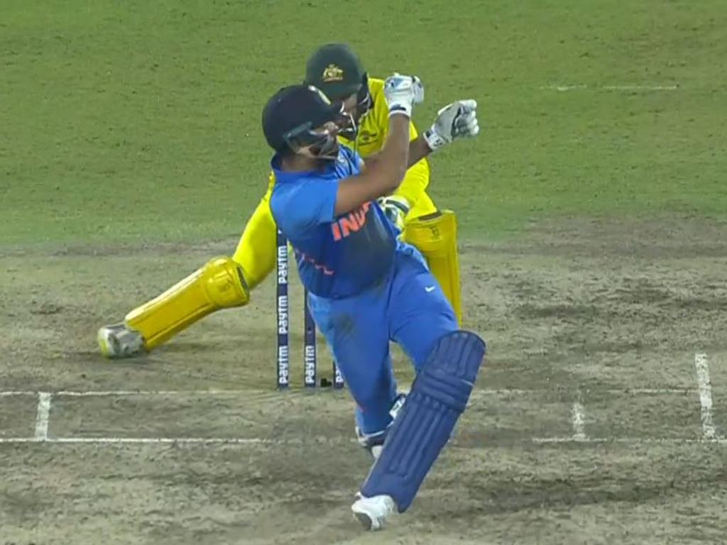 Rohit Sharma’s bat was somewhere down near fine leg.