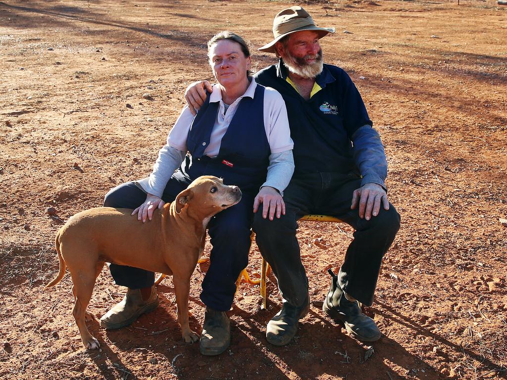 James Foster with partner Rachel Tibbey on Mr Foster’s merino sheep station 100km west of Walgett. Picture: Sam Ruttyn