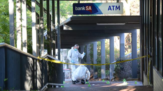 Forensic and crime-scene investigators at the scene of the murder. Picture: AAP / Brenton Edwards