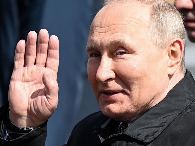 Russian President Vladimir Putin leaves Red Square after the Victory Day military parade in central Moscow. Picture: AFP