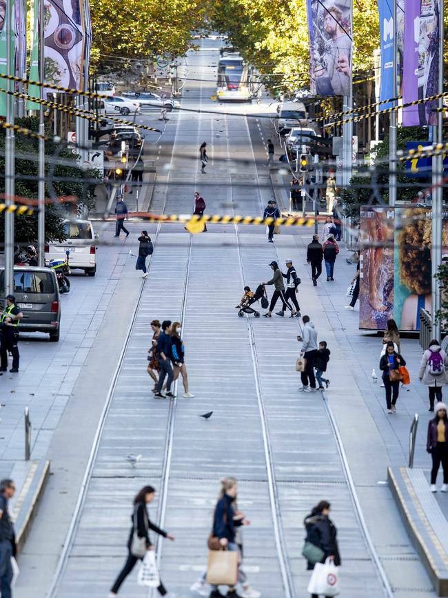 People enjoy a perfect day in Melbourne’s Bourke Street Mall. Picture: Tim Carrafa