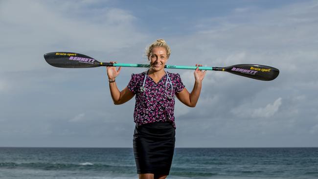 Surf Life Saving athlete Nadi Canning on Tugun beach with her stethoscope, for a story about balancing her career as a doctor with surf life saving training.  Picture: Jerad Williams