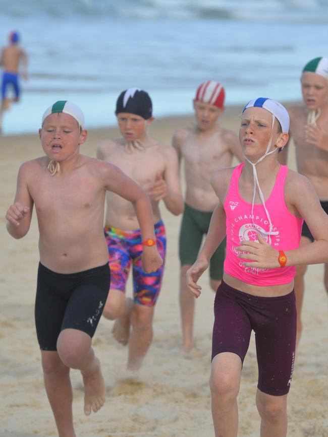 Running action at the Queensland Youth Surf Life Saving Championships on February 17.