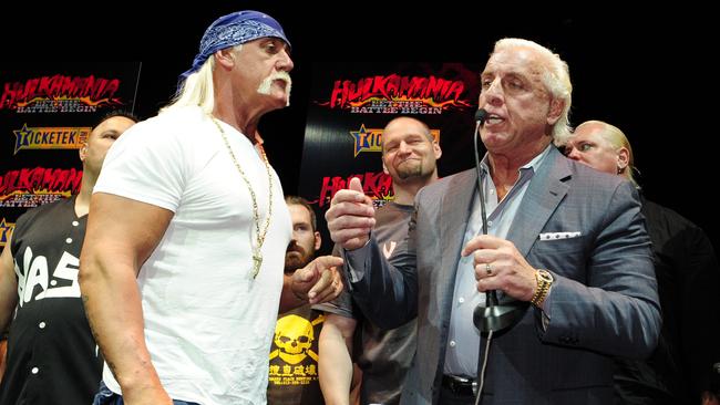 Flair (right) with Hulk Hogan at a Hulkamania Oz Tour event in Sydney. Photo: News Limited
