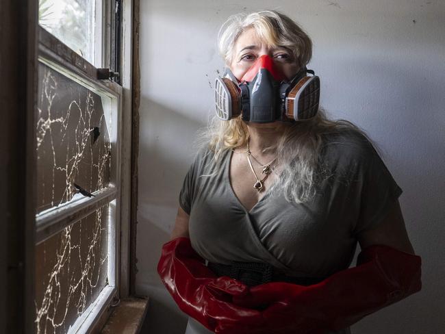 Connie Cicchini's rental in Brisbane has suffered $360k damage from meth user tenants.  Pictured is Connie inside the property where most of the damage has taken place.