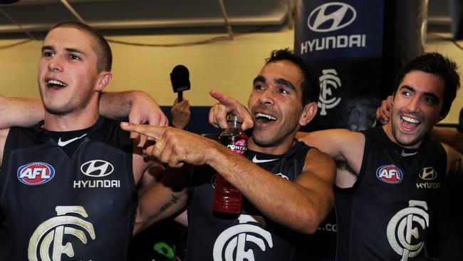 Marc Murphy, Eddie Betts and Kade Simpson after a win in 2010.