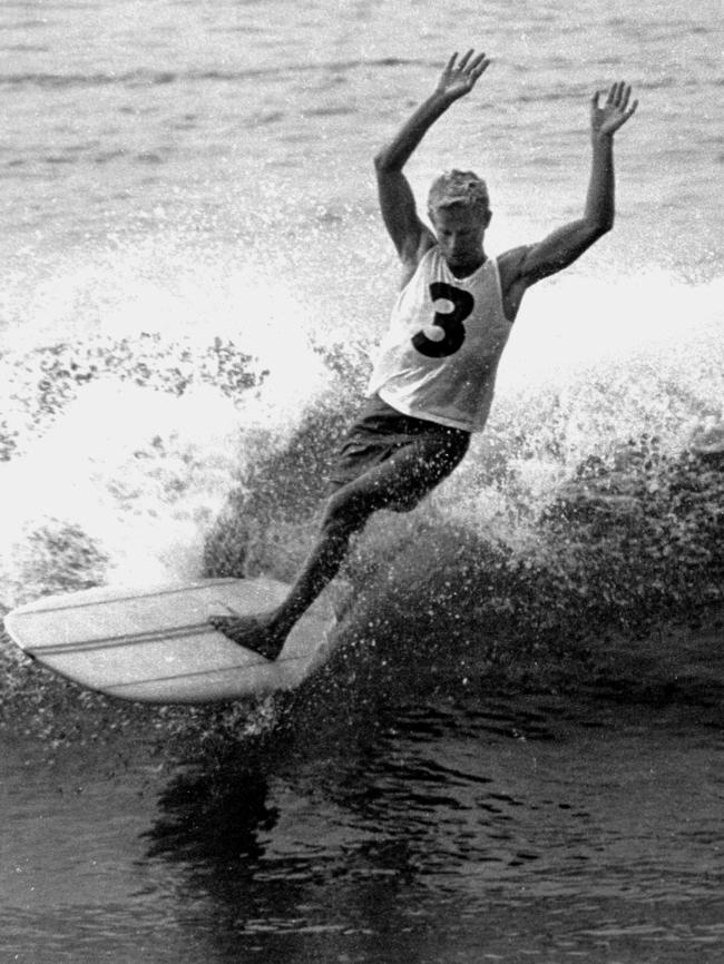 Surfer Bernard "Midget" Farrelly on his way to winning first world surfing championship in 1964. Pic Jack Eden, Surfabout Collection. Surfing A/CT Australia's First Century Historical