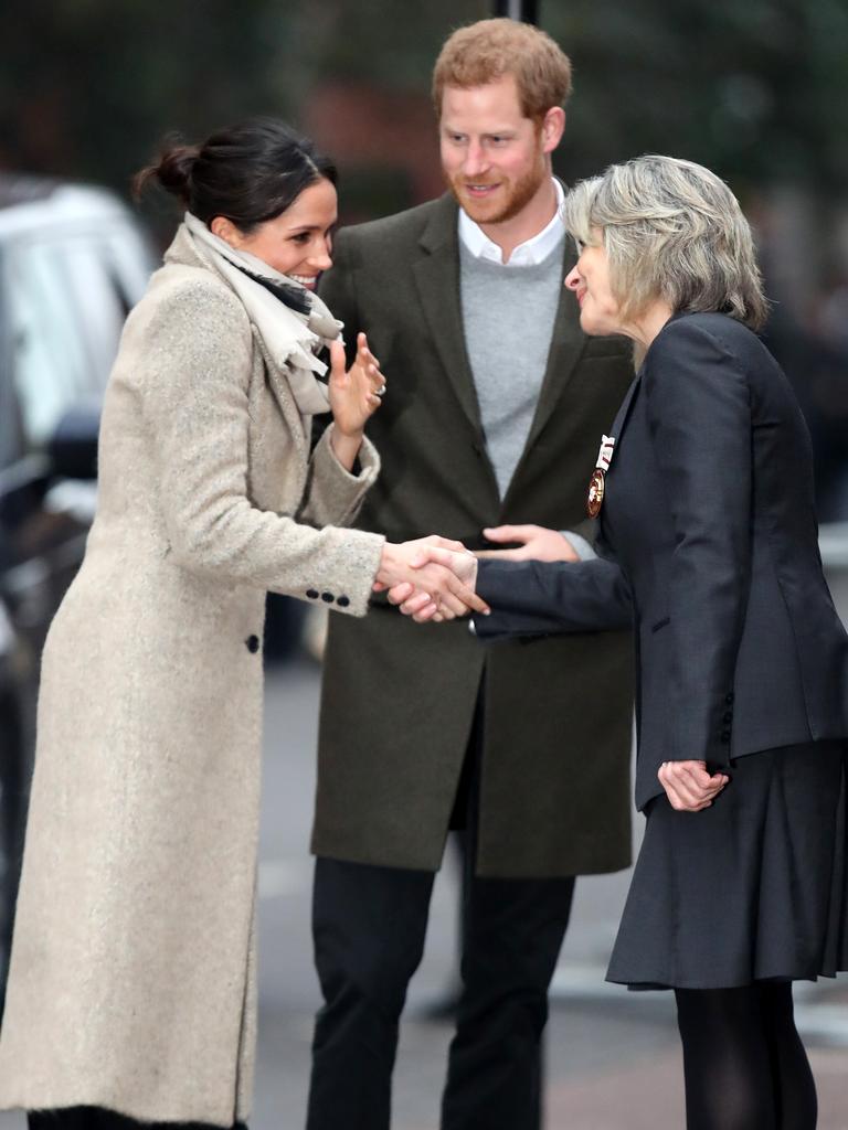 LONDON, ENGLAND - JANUARY 09: Prince Harry (C) and his fiancee Meghan Markle visit Reprezent 107.3FM on January 9, 2018 in London, England. The Reprezent training programme was established in Peckham in 2008, in response to the alarming rise in knife crime, to help young people develop and socialise through radio. (Photo by Chris Jackson/Getty Images)