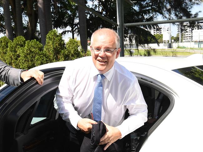 Australian Prime Minister Scott Morrison arrives for a funding announcement at Allan Border field in Brisbane, Monday, April 8, 2019. (AAP Image/Dave Hunt) NO ARCHIVING