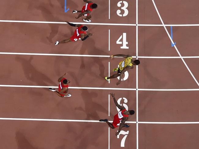 Usain Bolt dips on the line to beat Justin Gatlin in Beijing in 2015.