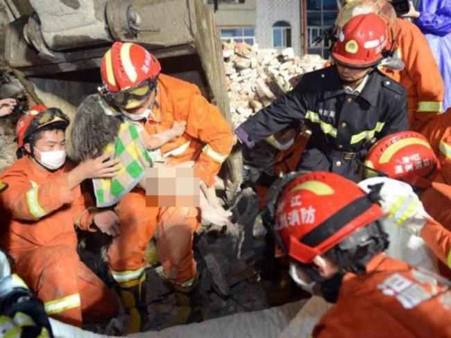 Three-year-old Wu Ningxi survived and suffered only minor physical injuries. Picture: AFP