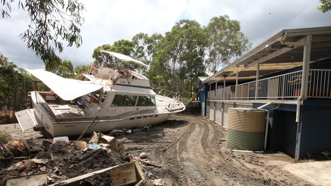 A Large boat called Balek washed up at Graceville, quite a distance from the river.