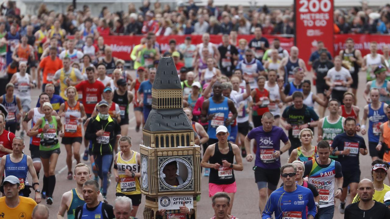 Lukas Bates, wearing a costume of the Queen Elizabeth Tower (known as Big Ben) runs with the crowd towards the finish line of the 39th London Marathon in London, UK, Sunday, April 28, 2019. Picture: AP