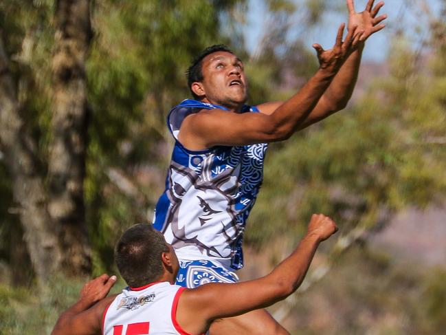 South Daniel Stafford takes a great mark over Federal Matty Axten. Picture: CHARLIE LOWSON