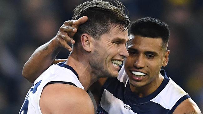 MELBOURNE, AUSTRALIA - JUNE 07: Tom Hawkins of the Cats is congratulated by Tim Kelly after kicking a goal during the round 12 AFL match between the Richmond Tigers and the Geelong Cats at Melbourne Cricket Ground on June 07, 2019 in Melbourne, Australia. (Photo by Quinn Rooney/Getty Images)