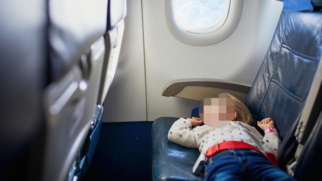 The passenger stood her ground and refused to move, likely not realising how awful it would be sitting next to an unaccompanied toddler on a long flight. Photo: iStock