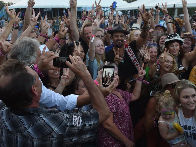 Michael Franti performs out in the general area with crowds at Bluesfest 2018 in Tyagarah near Byron Bay.