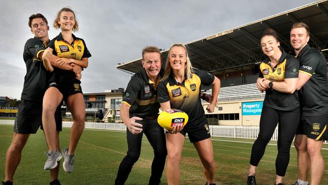 Glenelg has a few sister/brother/partner combinations, playing in its men's and women's league sides this year. (LtoR) Shae and her brother, Luke Partington, Nick Chigwidden with daughter Laura, and Alice and Andrew Bradley, at Glenelg oval. 25 February 2021. Picture Dean Martin