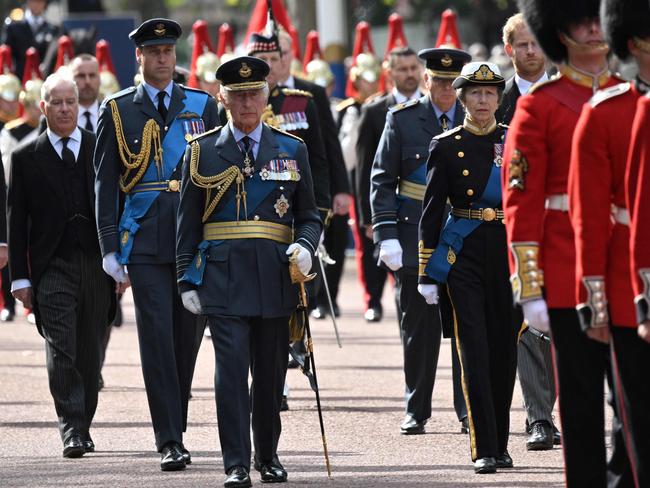 A sombre royal family walked behind the Queen’s coffin. Picture: AFP