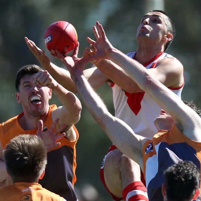 Ararat’s Tex Korewha soars over the top to take a great mark.