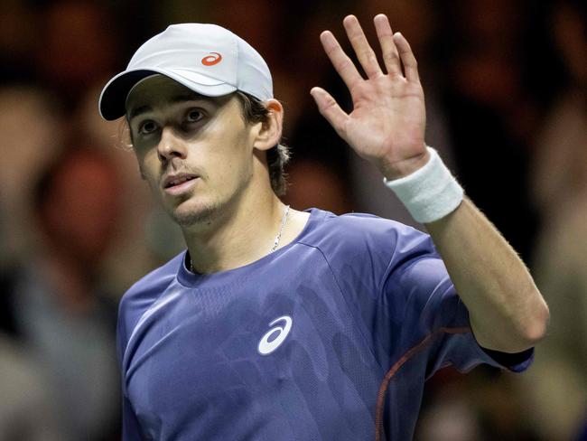 Australian Alex de Minaur waves after winning his men singles tennis match against Italy's Mattia Bellucci on the sixth day of the ATP Tour Rotterdam Open tennis tournament at the Ahoy venue in Rotterdam, on February 8, 2025. (Photo by Sander Koning / ANP / AFP) / Netherlands OUT