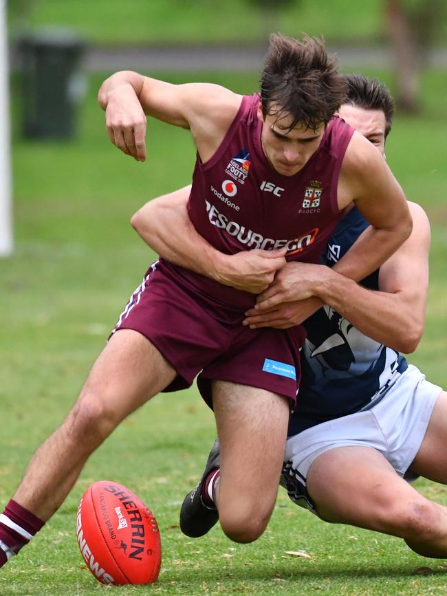 Prince Alfred’s Alex McKenzie is wrapped up against Henley. Picture: AAP/Keryn Stevens