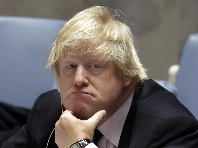 FILE - In this Thursday, March 23, 2017 file photo Britain's then Foreign Minister Boris Johnson listens to delegates in the United Nations Security Council on Somalia. Johnson, who visited Somalia last week, chairs a U.N. Security Council meeting on the humanitarian and political situation in the Horn of Africa nation. (AP Photo/Richard Drew, File)