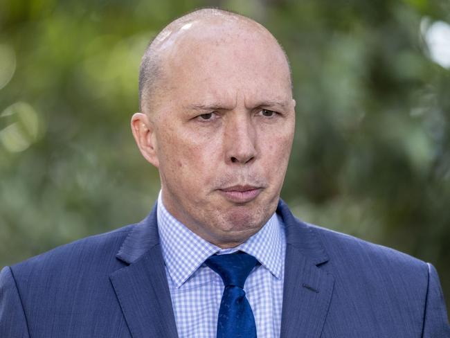 Minister for Home Affairs and Immigration and Border Protection Peter Dutton, speaks to media in Bracken Ridge, Brisbane, Friday, July 20, 2018.  Dutton has called on Opposition Leader Bill Shorten to explain whether embattled Labor MP Emma Husar used staff entitlements appropriately. (AAP Image/Glenn Hunt) NO ARCHIVING