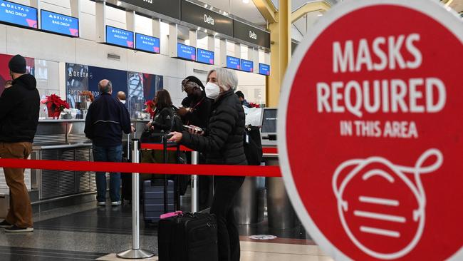 Passengers wait to check in for their flight at Ronald Reagan International Airport in Washington, DC. Picture: Roberto Schmidt/AFP