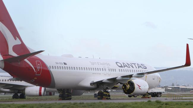 Qantas planes lie dormant at Adelaide Airport. Picture: Emma Brasier