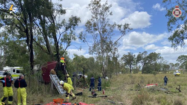 Fireys have worked for more than two hours to free a truck driver man left trapped by a tree following a serious two-vehicle head-on crash at the Carmans Rd and Bruce Highway intersection at Monduran. Photo: Lifeflight