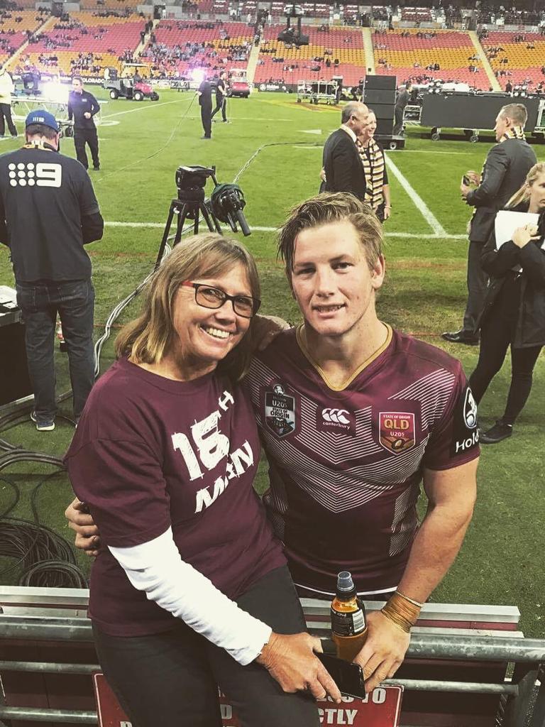 Harry with his mum after playing for Queensland at junior level.