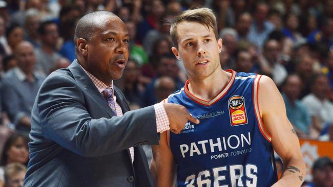 Joey Wright speaks to Nathan Sobey during the loss to the Hawks. Picture:/Brenton Edwards (AAP).