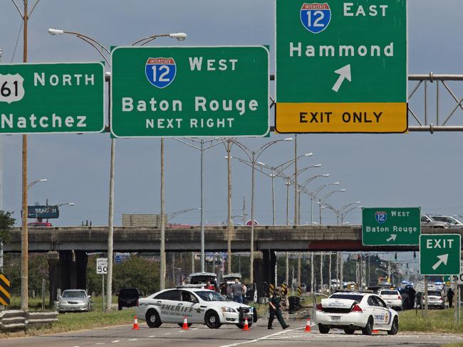 Baton Rouge police block Airline Highway after police were shot in Baton Rouge, Louisiana. Picture: AP Photo/Max Becherer