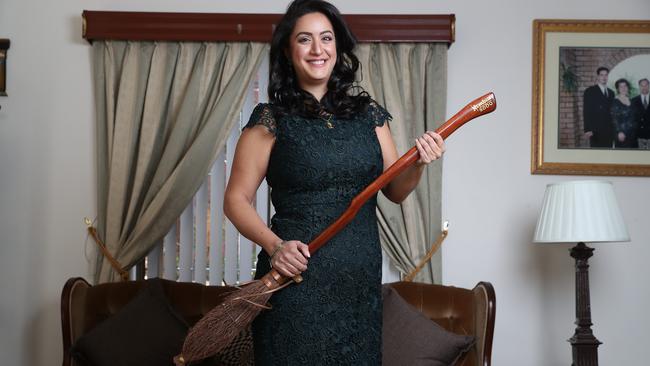 Opera Australia's, Natalie Aroyan with one of her Harry Potter Nimbus 2000 broom stick that her dad made for her. Picture: David Swift