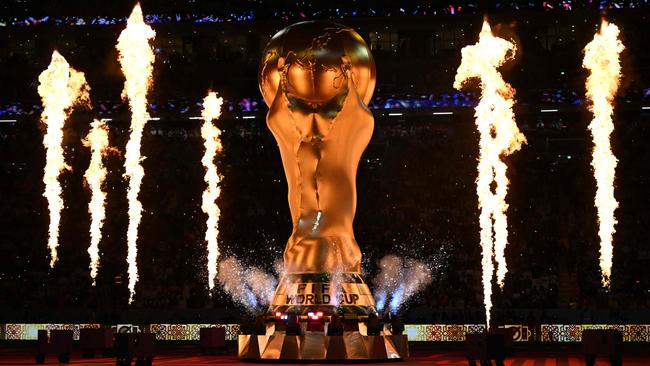 Fireworks explode around a replica of the World Cup trophy during the opening ceremony at the Al-Bayt Stadium, north of Doha. Picture: AFP