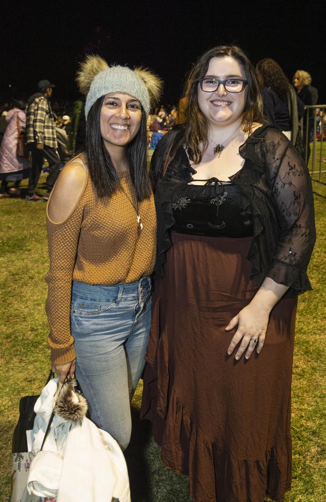 Natalie Rizkallah (left) and Megan Chalker at the Symphony Under the Stars concert performed by the Queensland Symphony Orchestra in Queens Park Amphitheatre for Carnival of Flowers, Friday, October 4, 2024. Picture: Kevin Farmer