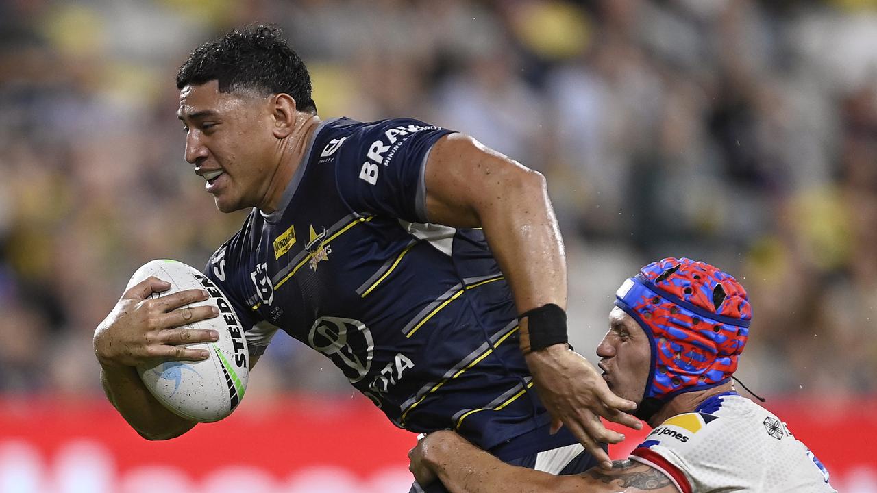TOWNSVILLE, AUSTRALIA - MAY 07: Jason Taumalolo of the Cowboys is tackled by Kalyn Ponga of the Knights during the round nine NRL match between the North Queensland Cowboys and the Newcastle Knights at Qld Country Bank Stadium, on May 07, 2022, in Townsville, Australia. (Photo by Ian Hitchcock/Getty Images)