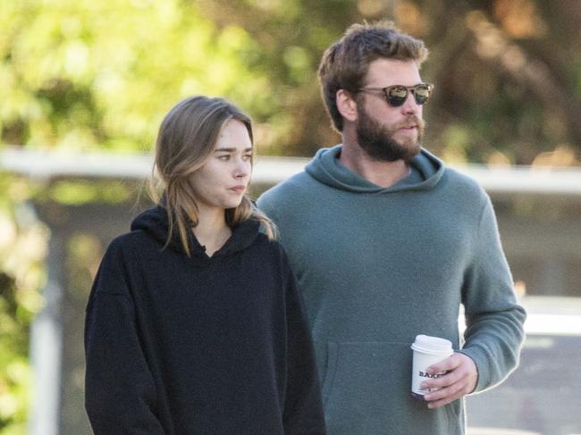 Liam Hemsworth with his girlfriend Gabriella Brooks in Byron Bay. Picture: Media Mode