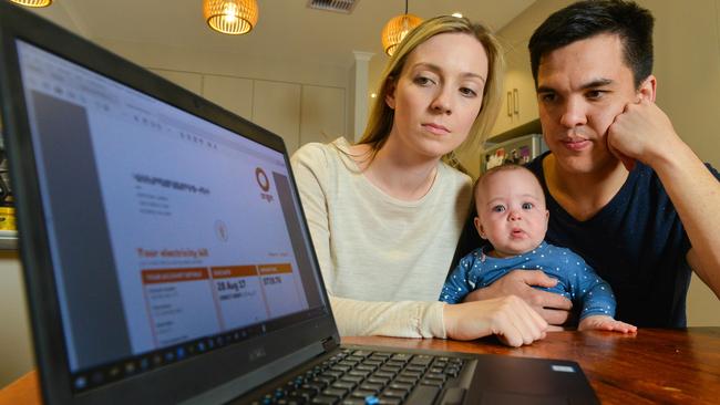 Anthony and Alannah James, with baby Xavier, at their Klemzig home. Their electricity bill more than doubled in the past two quarters.