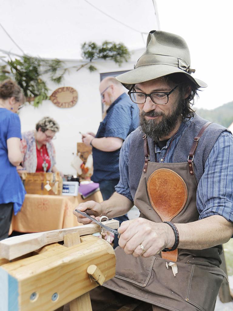 Spoon maker David Rauenbusch has carved a niche for himself, being recognised at the best non-food stall at this year's Taste of the Huon show. Picture: MATHEW FARRELL