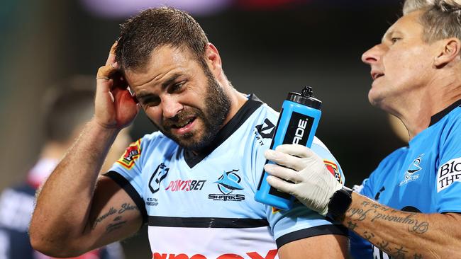 SYDNEY, AUSTRALIA - APRIL 10:  Wade Graham of the Sharks leaves the field with a head injury during the round five NRL match between the Sydney Roosters and the Cronulla Sharks at Sydney Cricket Ground, on April 10, 2021, in Sydney, Australia. (Photo by Mark Kolbe/Getty Images)