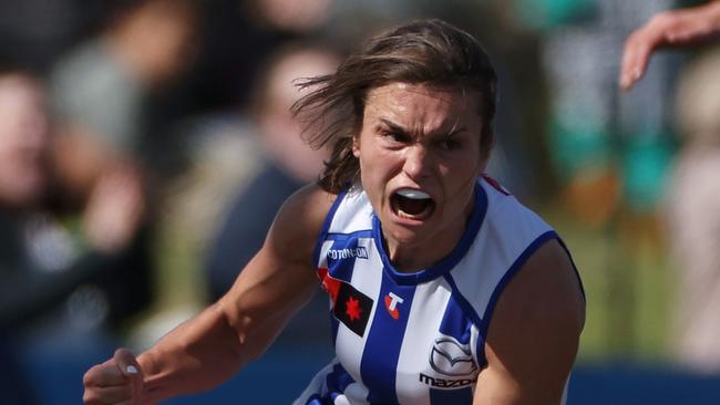 MELBOURNE, AUSTRALIA - SEPTEMBER 15: Ash Riddell of the Kangaroos celebrates kicking a goal during the round three AFLW match between Melbourne Demons and North Melbourne Kangaroos at Casey Fields, on September 15, 2024, in Melbourne, Australia. (Photo by Daniel Pockett/AFL Photos/via Getty Images)