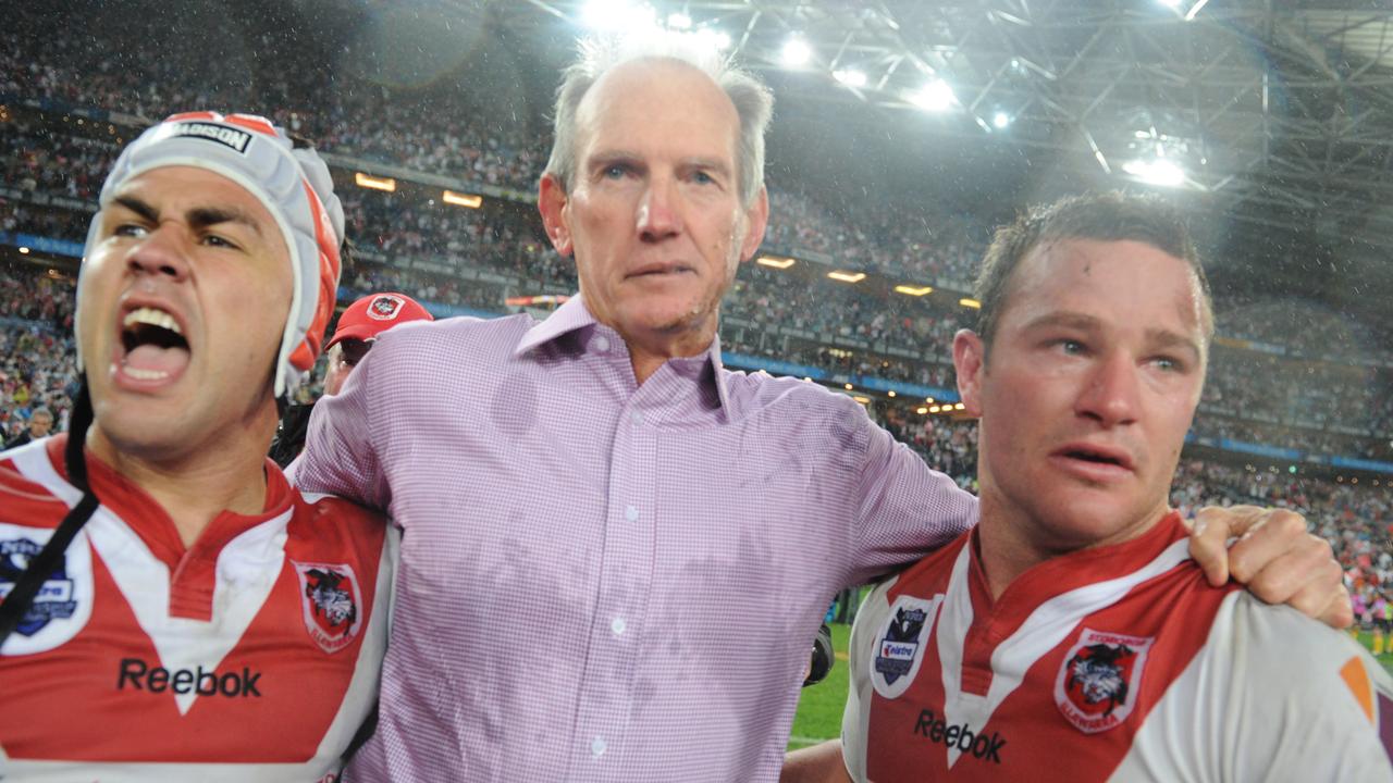 Wayne Bennett (centre) with Jamie Soward (left) and Dean Young after leading St George Illawarra to the 2010 premiership.