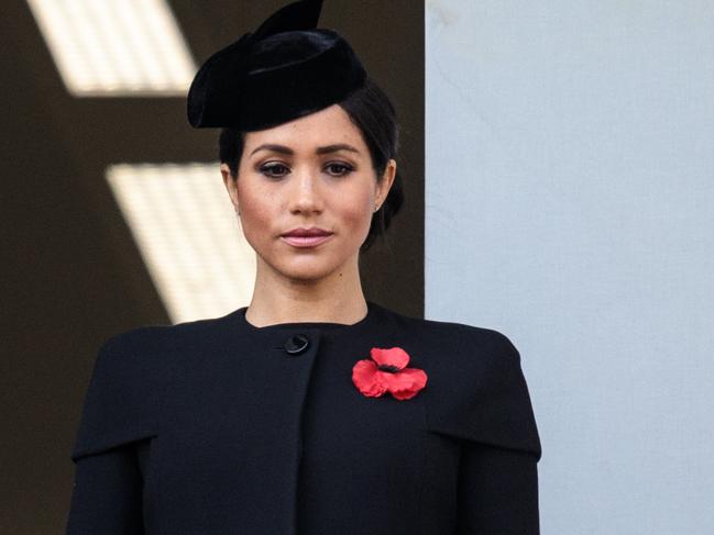 A sombre Meghan watches on. Picture: Getty Images