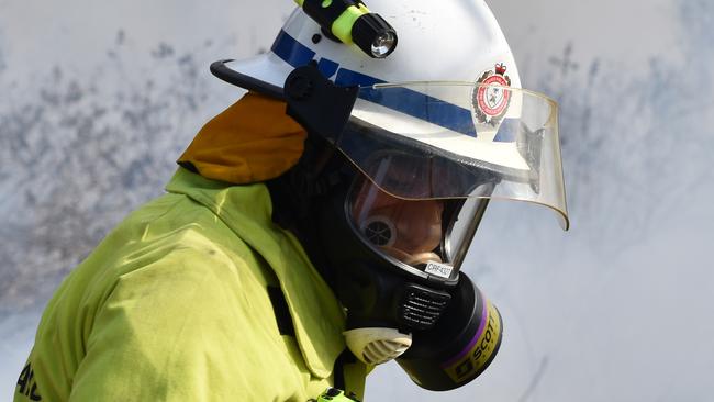 A Queensland firefighter in action. File image. Picture: Zizi Averill